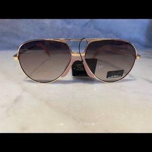 Sun glasses gold and rose pink trim aviator